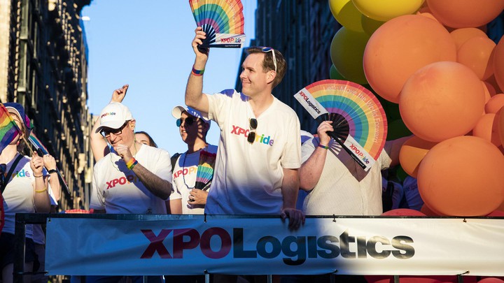 Employees on Pride float