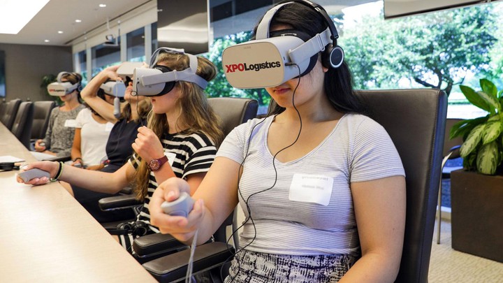 Students from Girls With Impact visit XPO's Greenwich headquarters and try out our custom VR setup